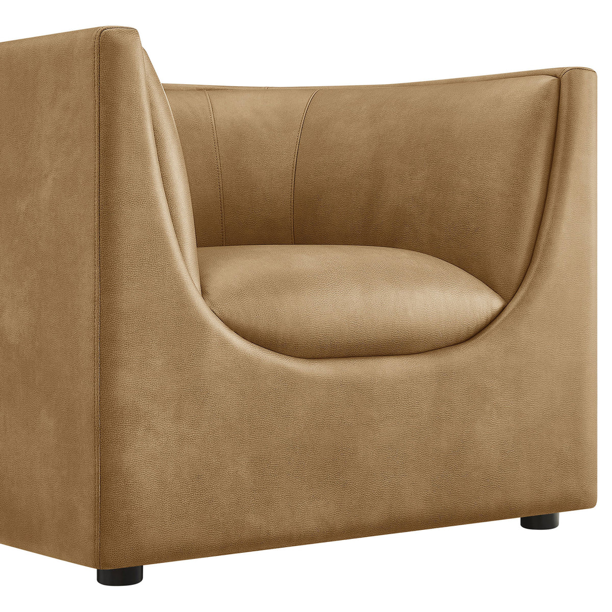 Pebbled vegan leather and a graceful arm curve frame the generously padded seat || EEI-7569-TST || detail_studio