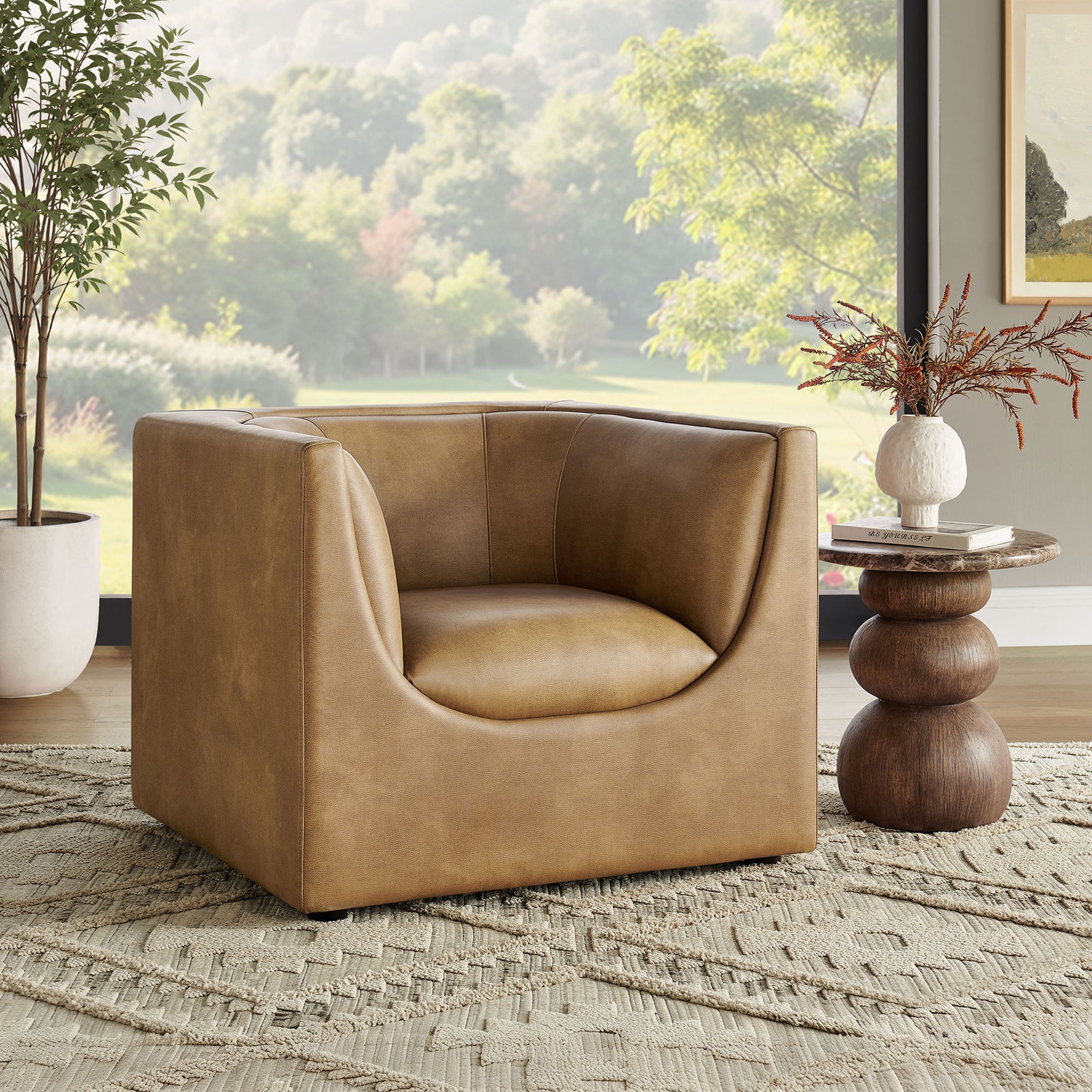Warm toast hue pairs with a bold cube silhouette for modern comfort that anchors the room || EEI-7569-TST || front_angle_room