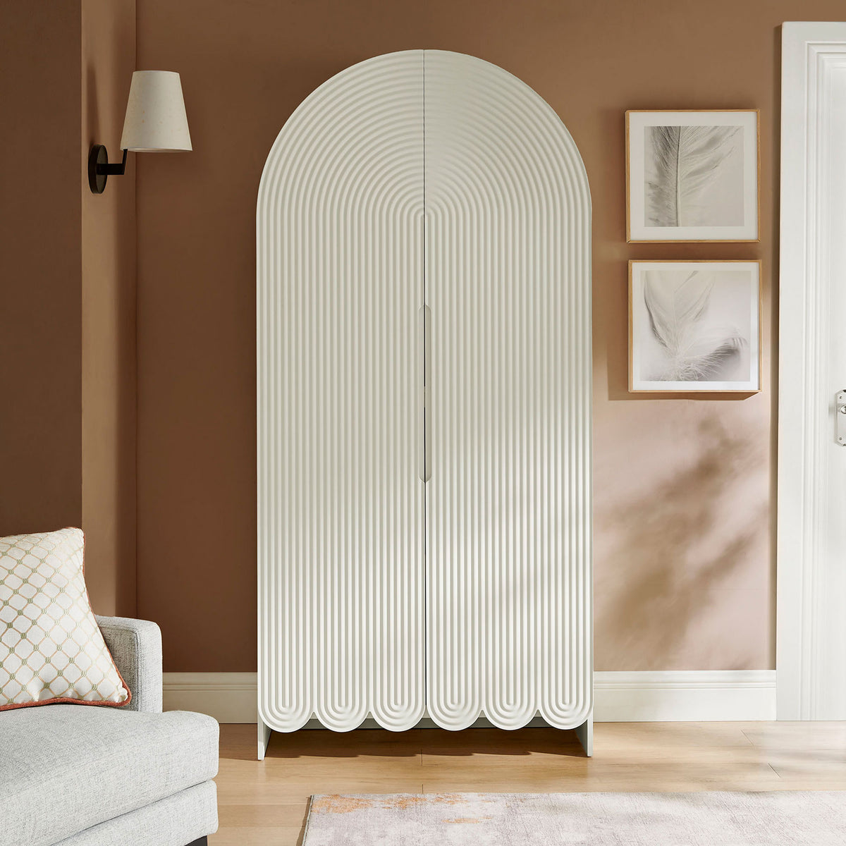White arched storage cabinet bringing sculptural fluted texture to a warm living room || EEI-7570-WHI || front_room