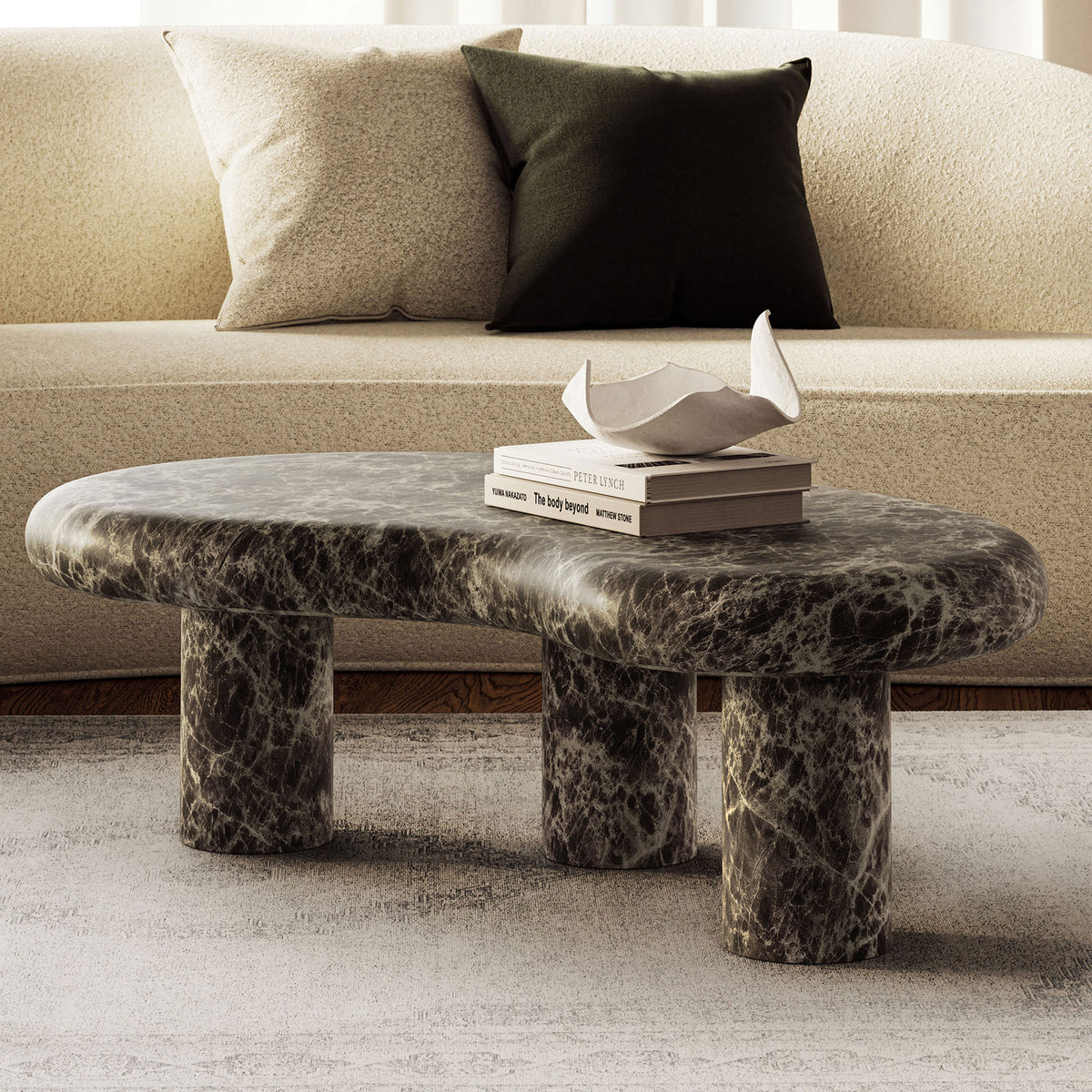 Elowen faux marble coffee table anchors a neutral living room with its sculptural form and rich brown tones || EEI-7573-EMP || front_angle_room