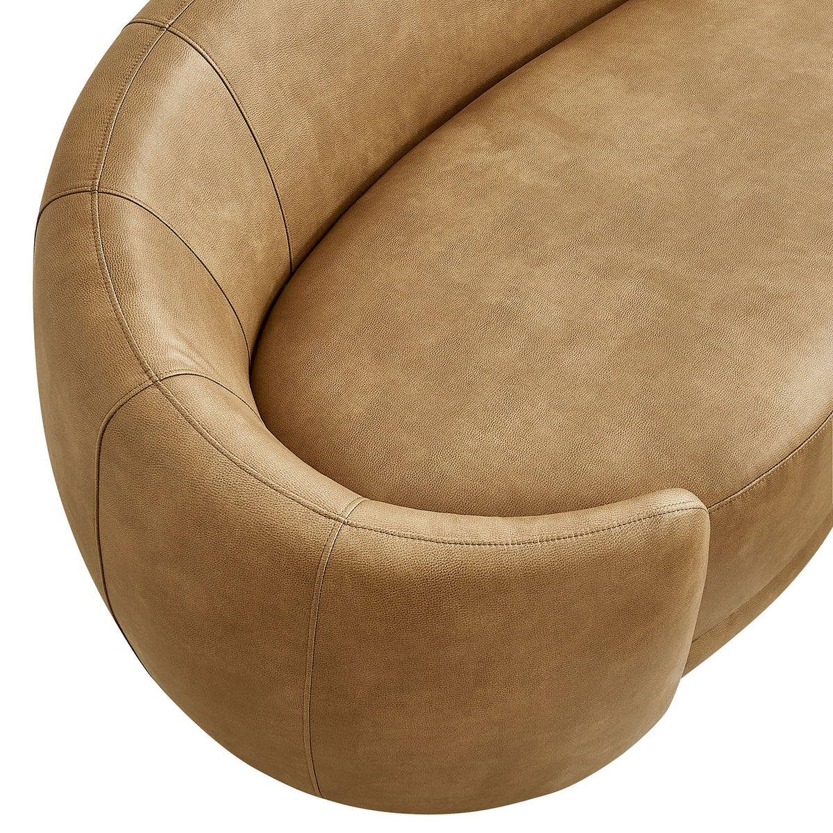 Sweeping curved arm and tight-back seams showcase the smooth toast vegan leather texture || EEI-7582-TST || detail_studio
