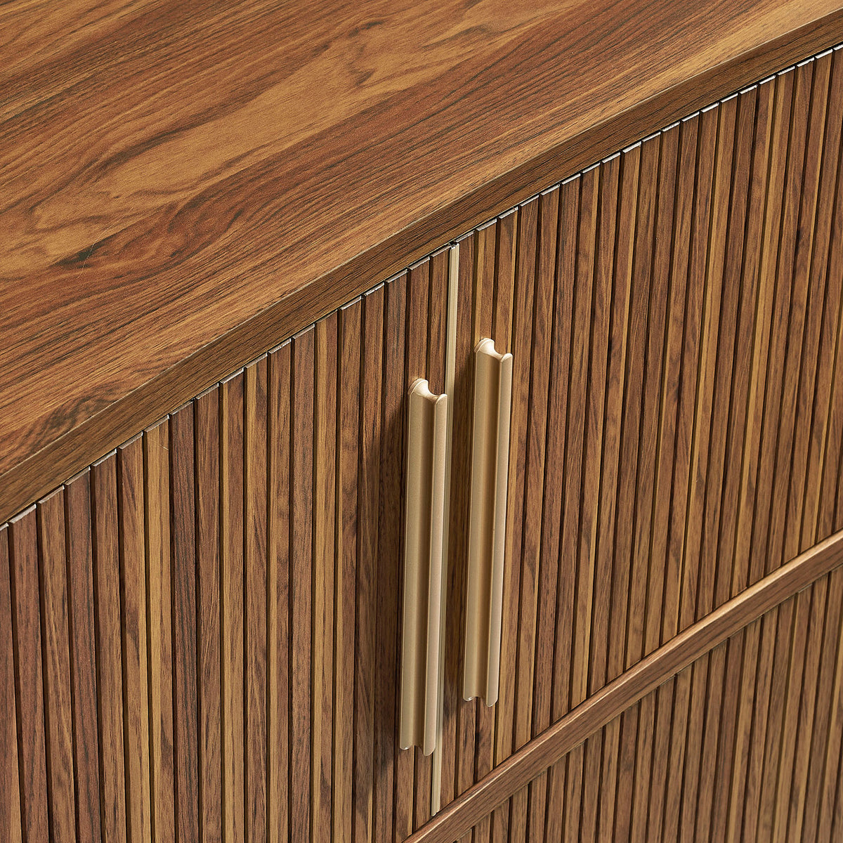 Gold-finished vertical pulls stand out against the richly grained walnut tambour front for a luxe accent || EEI-7583-WAL || handle_studio