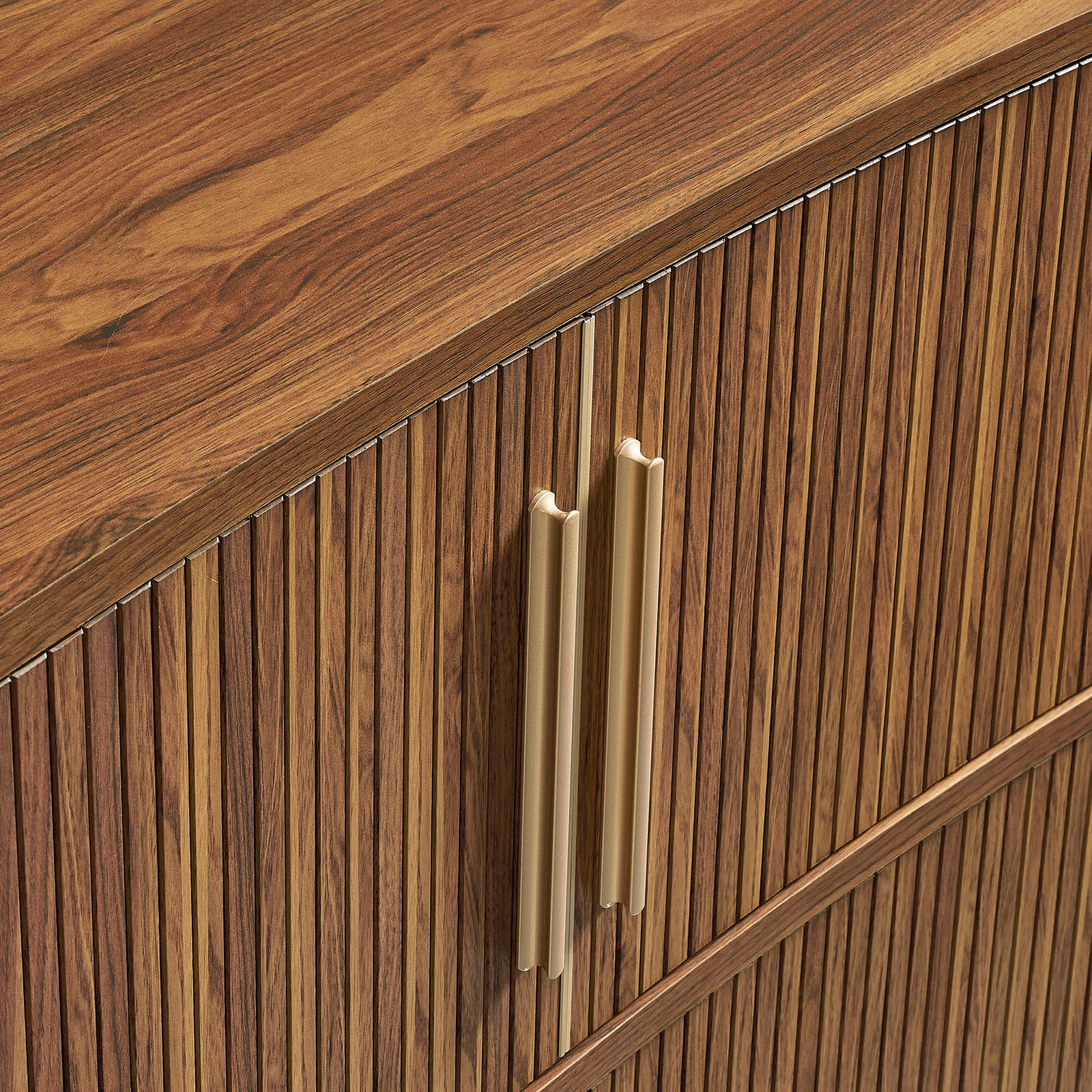 Gold-finished vertical pulls stand out against the richly grained walnut tambour front for a luxe accent || EEI-7583-WAL || handle_studio