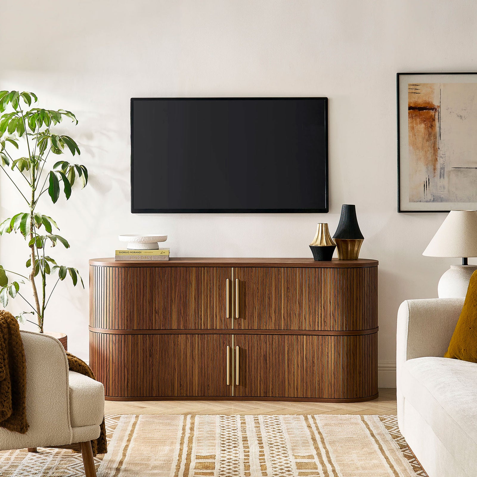 Walnut fluted cabinet anchors the living room as a media console, complementing neutral seating and decor || EEI-7583-WAL || front_room
