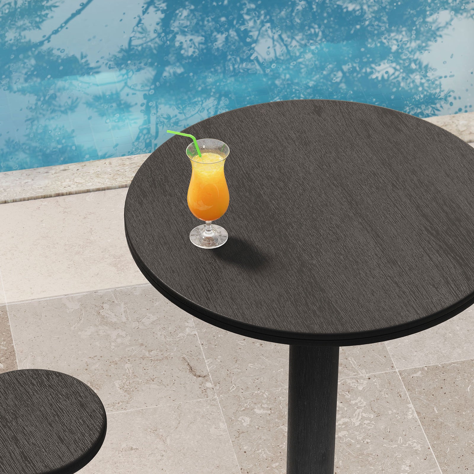 Black round bar table by the pool featuring wood grain top ideal for serving refreshing drinks. || EEI-7585-BLK || detail_room