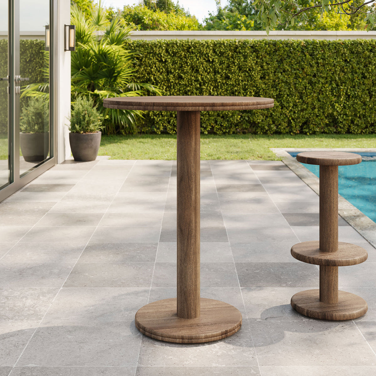 Cocoa brown acacia bar table on patio with matching pedestal stool, perfect for casual poolside gatherings. || EEI-7585-COA || front_angle_room