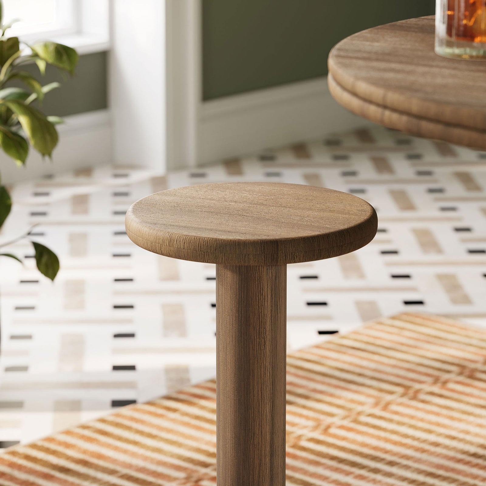 Cocoa brown acacia bar stool seat styled next to a bar table in a patterned indoor dining space || EEI-7586-COA || detail_room