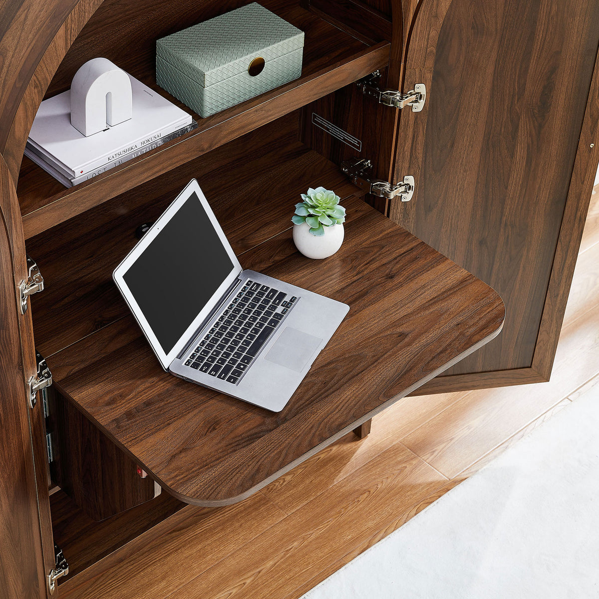Fold-out desk creates a tidy laptop station inside the cabinet, with shelves and cord pass-through nearby || EEI-7604-WAL || detail_converted_room