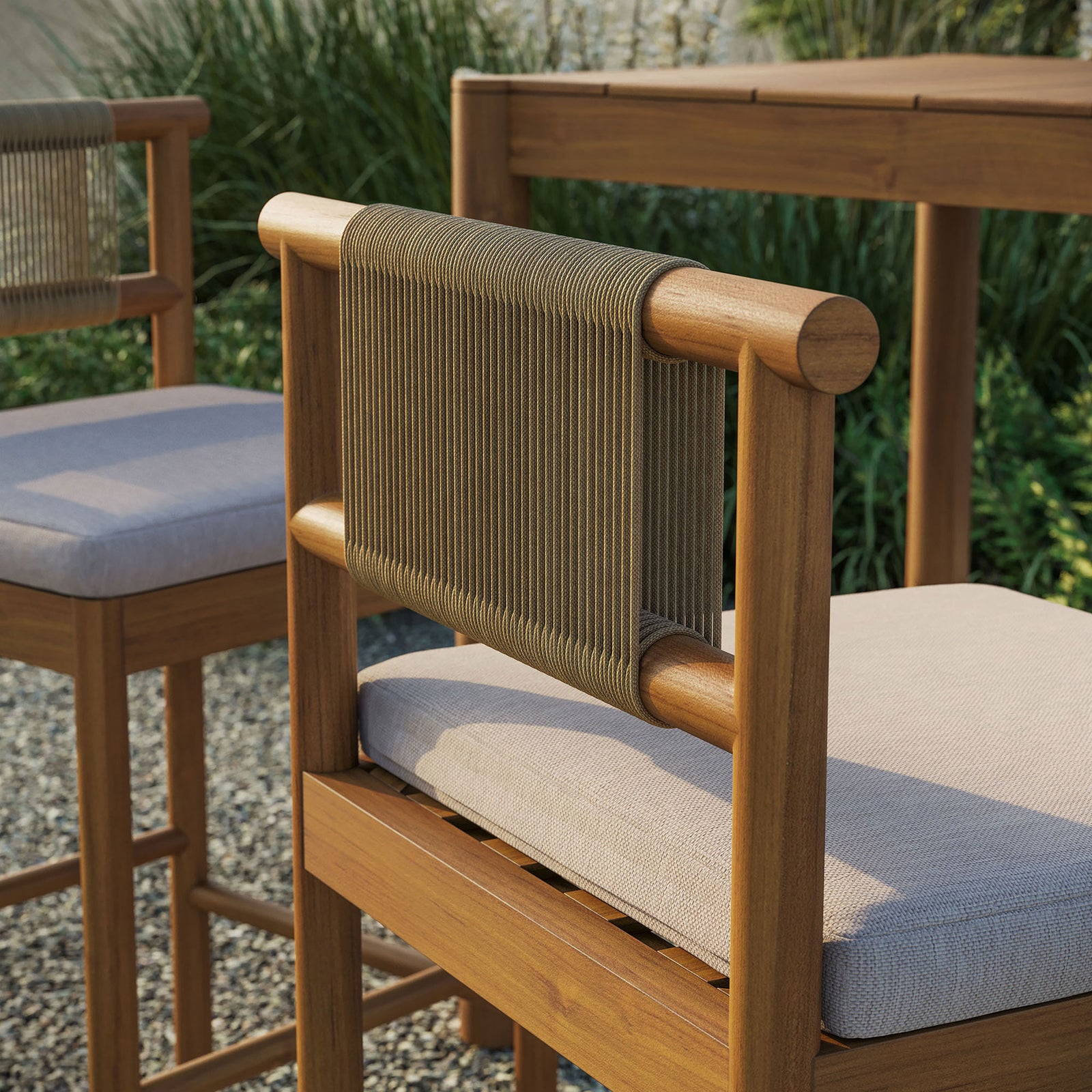 Outdoor close-up of bar stool rope back and cushion styled beside a teak bar table || EEI-7626-NAT-SAI || detail_room