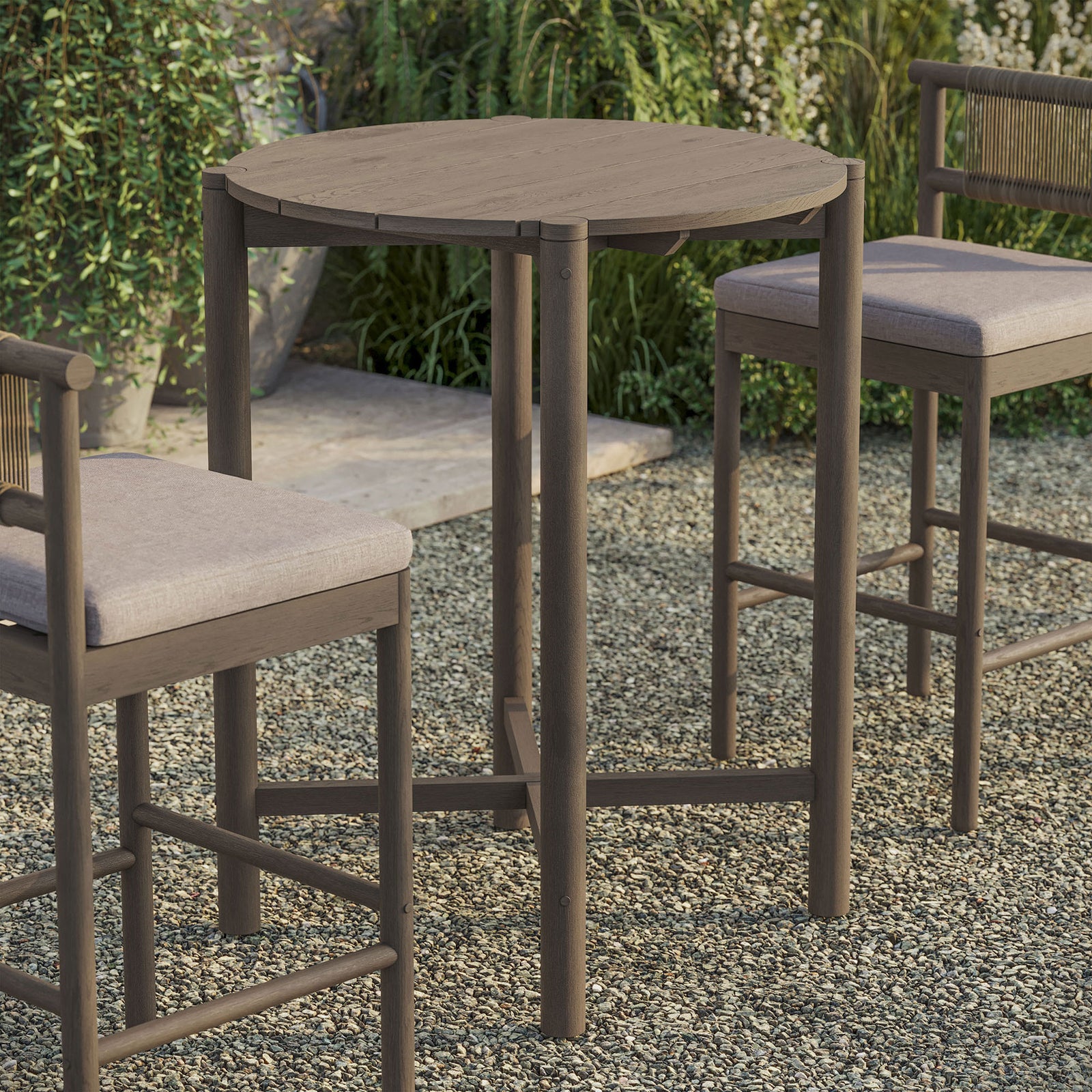 Weathered gray teak round bar table creates a cozy outdoor perch with coordinating stools || EEI-7628-WGR || front_angle_room