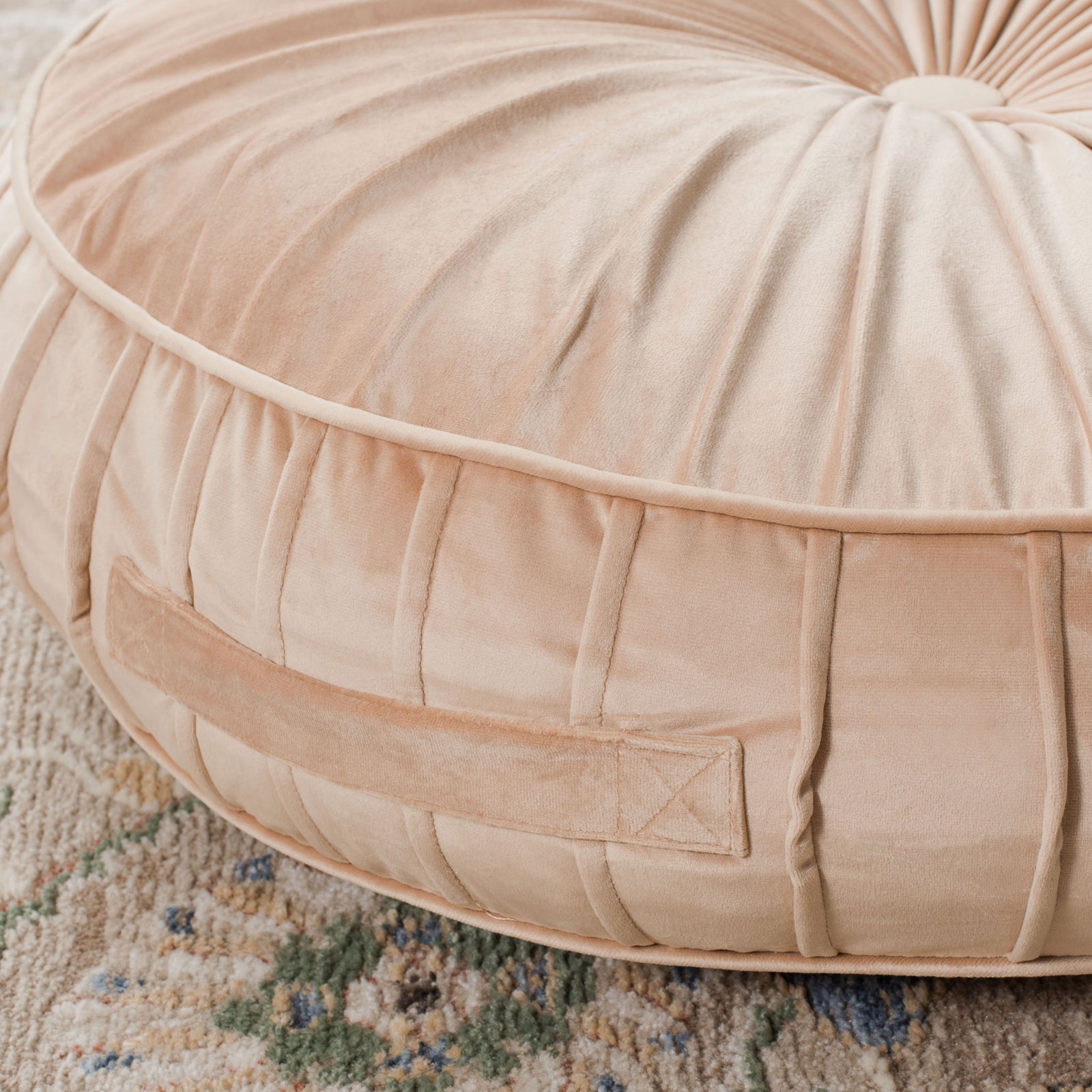 A sewn-in fabric handle and vertical pleats give this champagne floor pillow a tailored edge || FLP1000C-2424 || handle_room