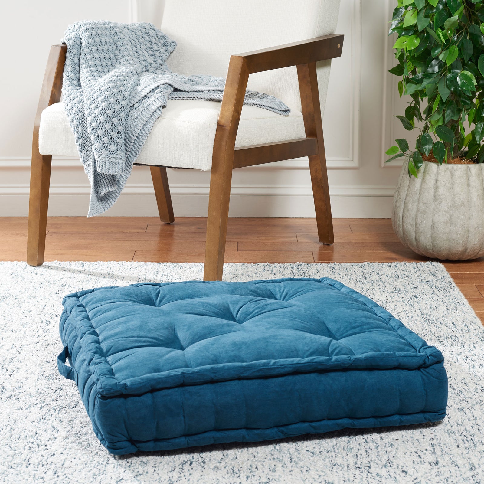 Deep turquoise floor pillow with plush tufting and a thick, padded edge || FLP1002B || front_angle_room