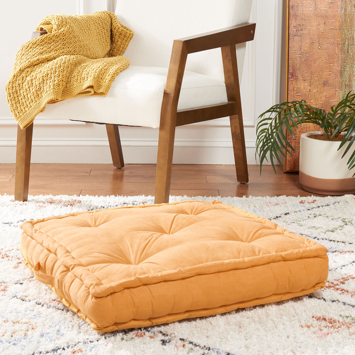 Golden ginger floor pillow with deep tufting and a thick seat cushion || FLP1002C || front_angle_room