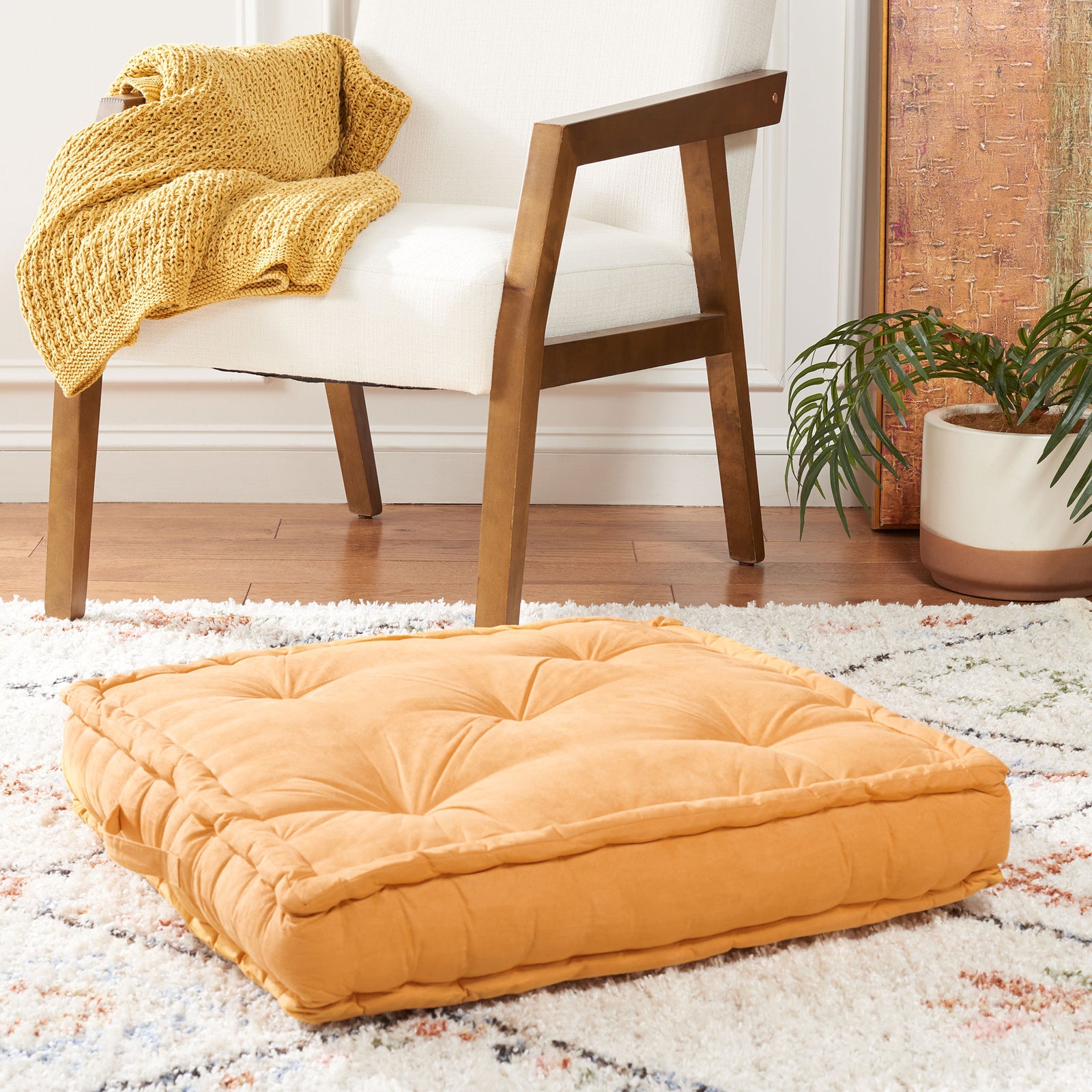 Golden ginger floor pillow with deep tufting and a thick seat cushion || FLP1002C || front_angle_room