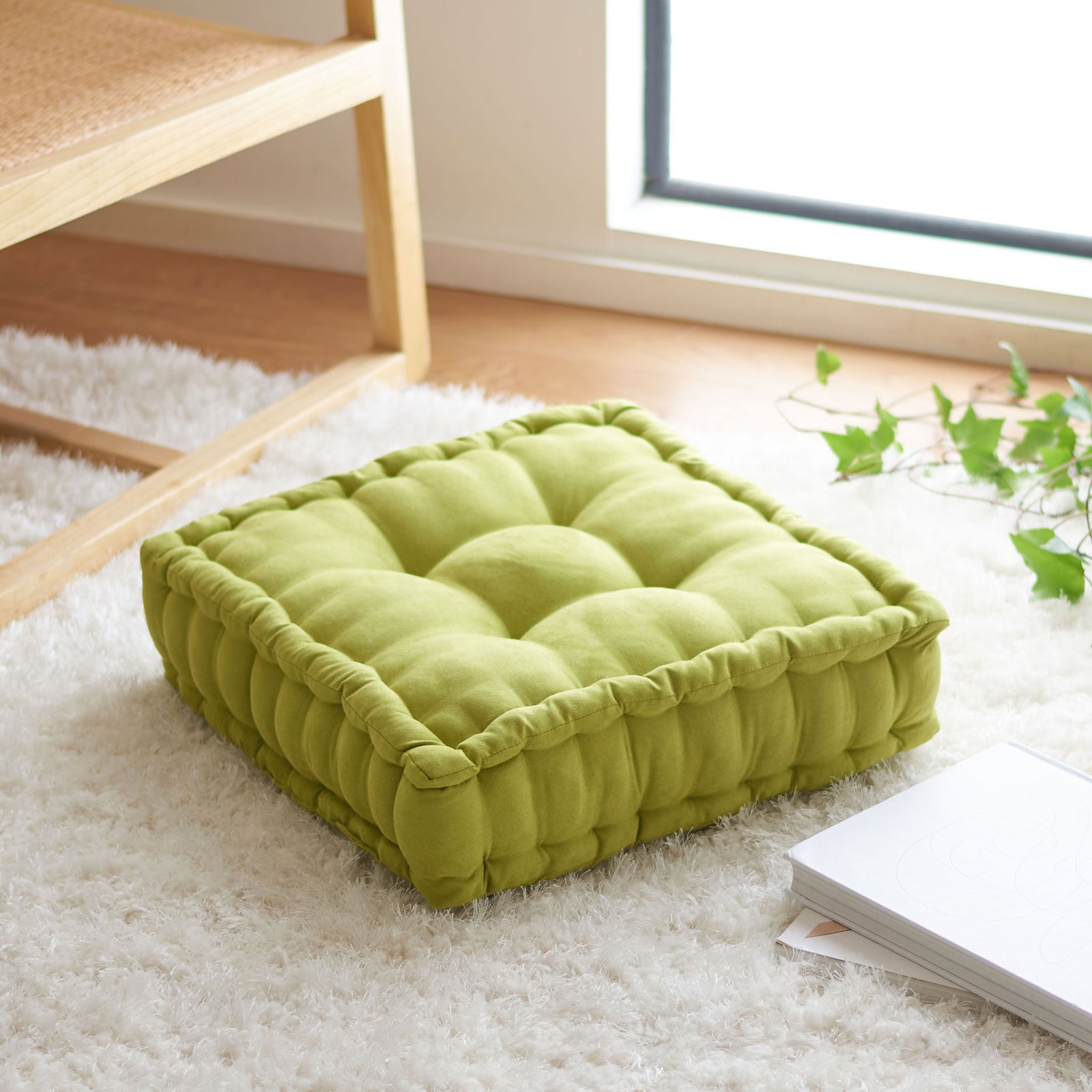 Fresh light green floor pillow with pillowy tufted padding and a softly gathered sidewall || FLP1002F || front_angle_room