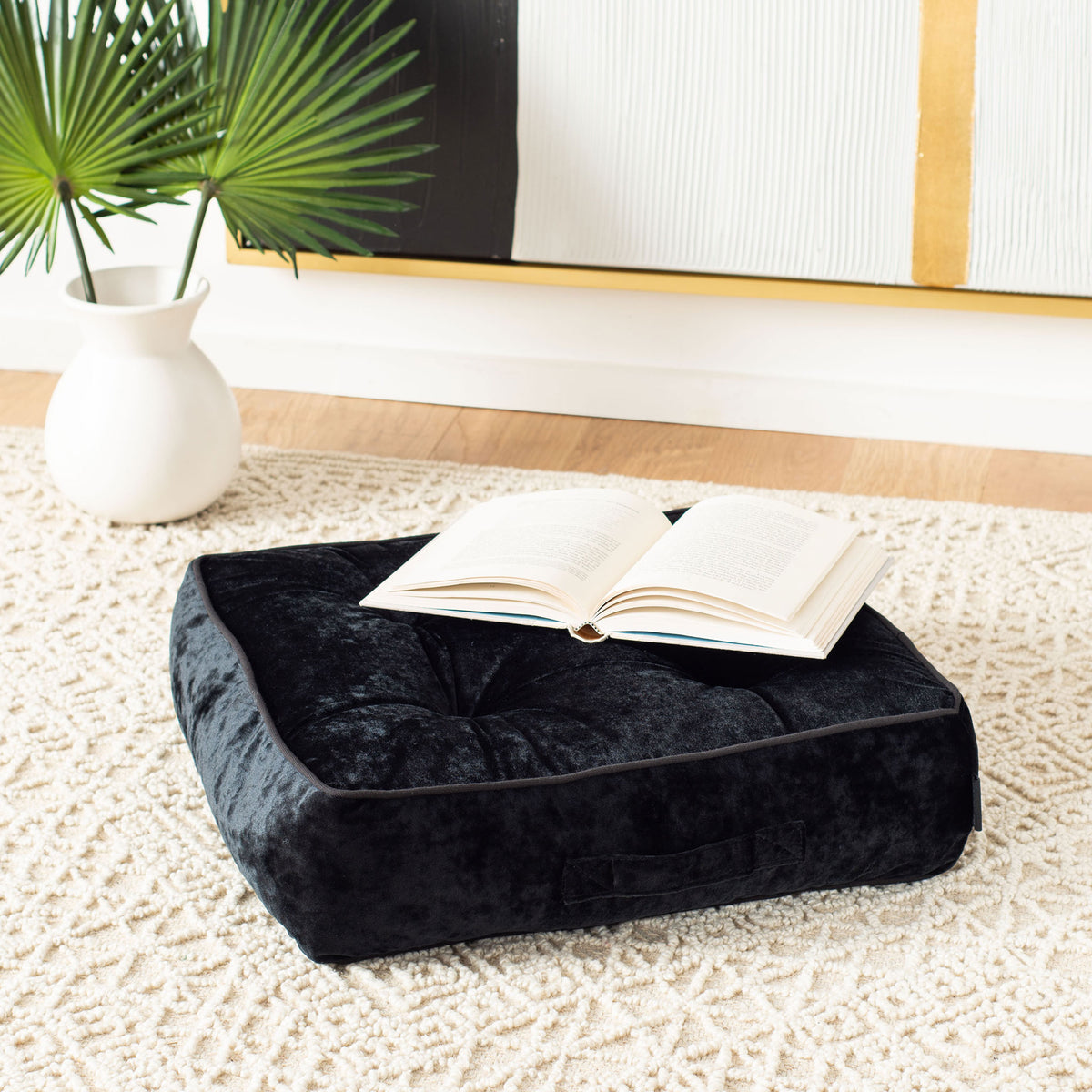 Cushioned black velvet floor pillow offers a cozy, tufted spot for reading || FLP1004D || front_angle_room