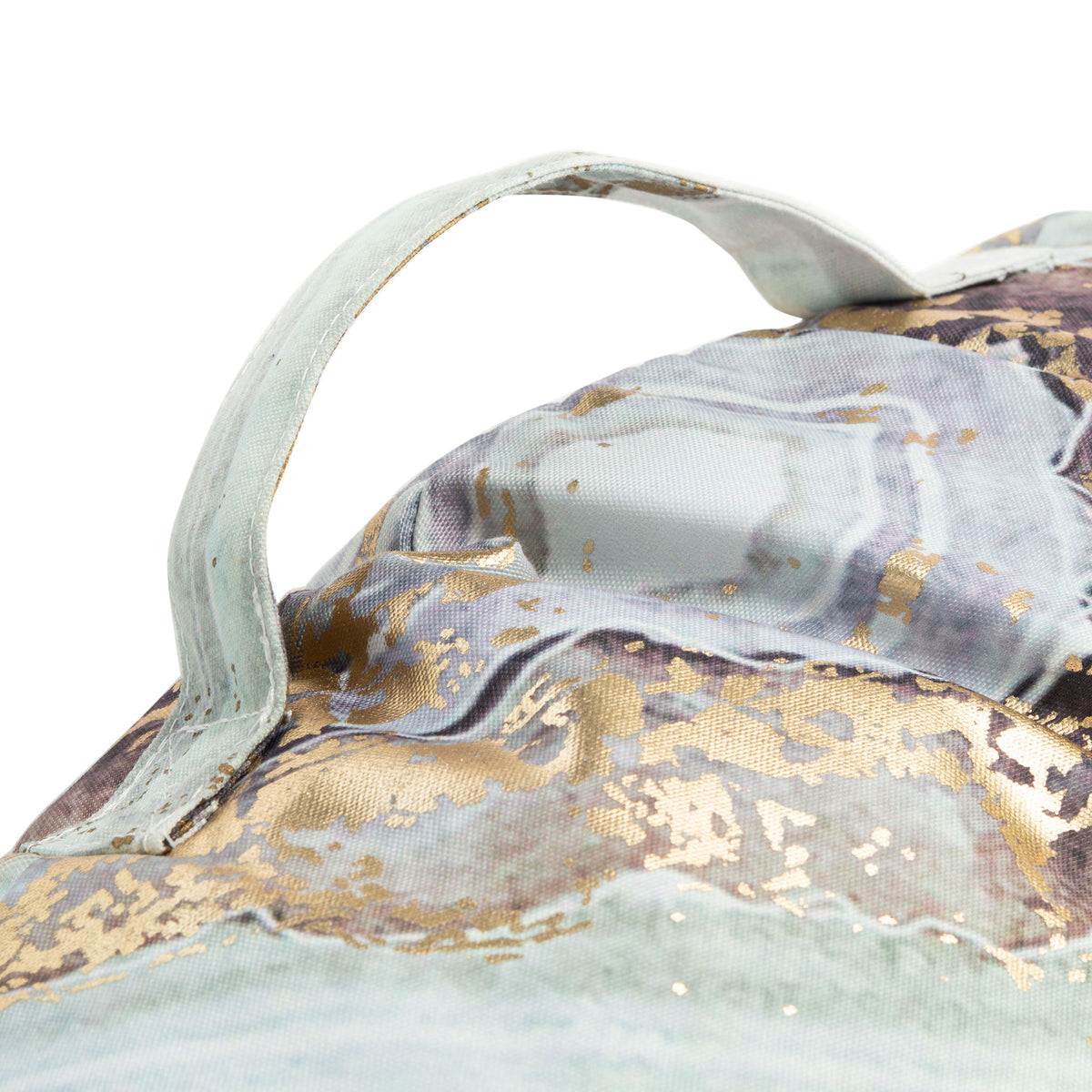 A fabric carry loop rises from plush marbled fabric with shimmering gold details || FLP1009A || handle_studio