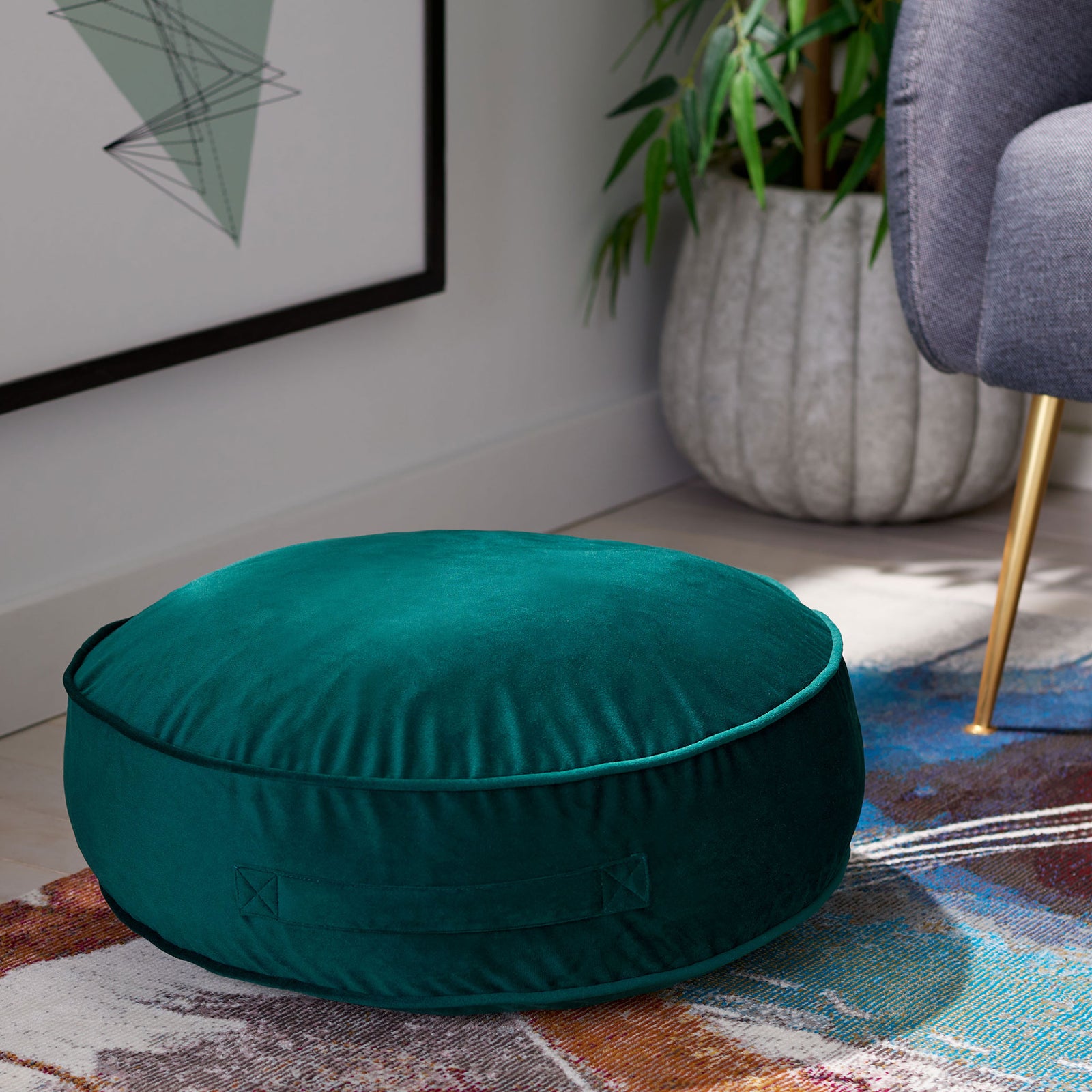 Plush green floor pillow sits low with a rounded shape and handy side handle || FLP1013A || front_angle_room