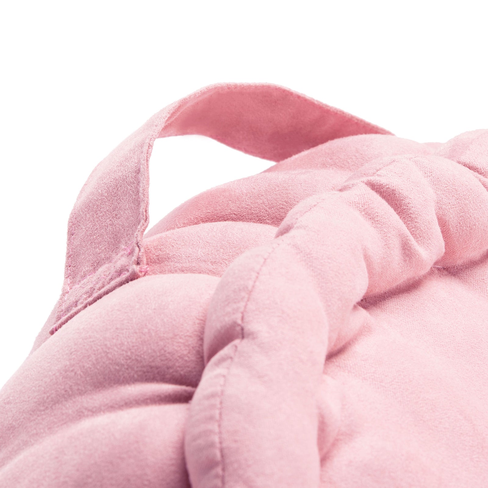 Soft pink carrying loop arches above the cushion's rounded, stitched edge || FLP1014B || handle_studio