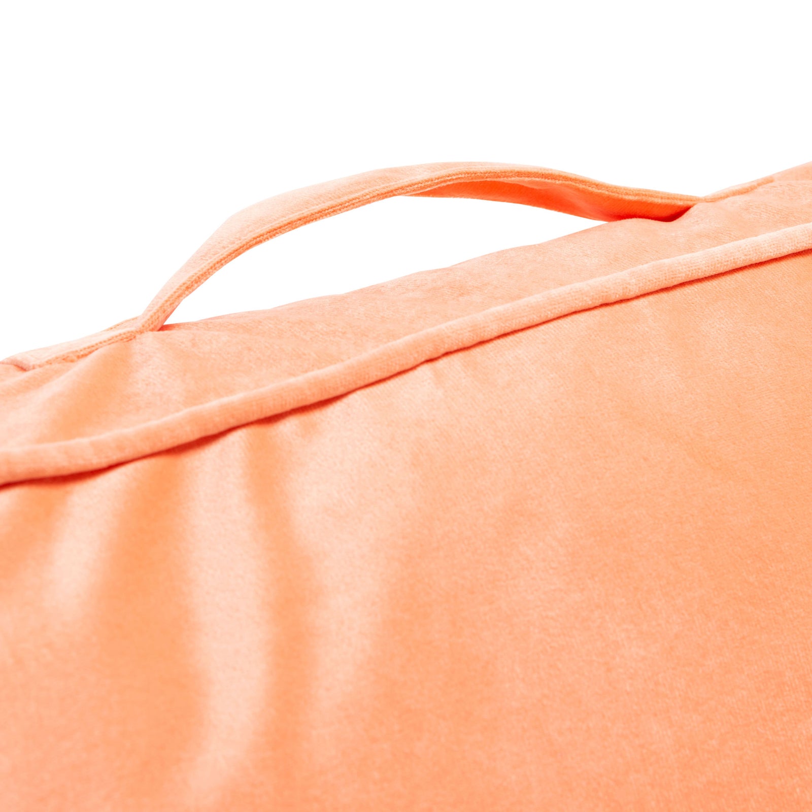 A fabric carry handle and tailored piping add practical detail to this soft peach floor pillow || FLP1015A || handle_studio