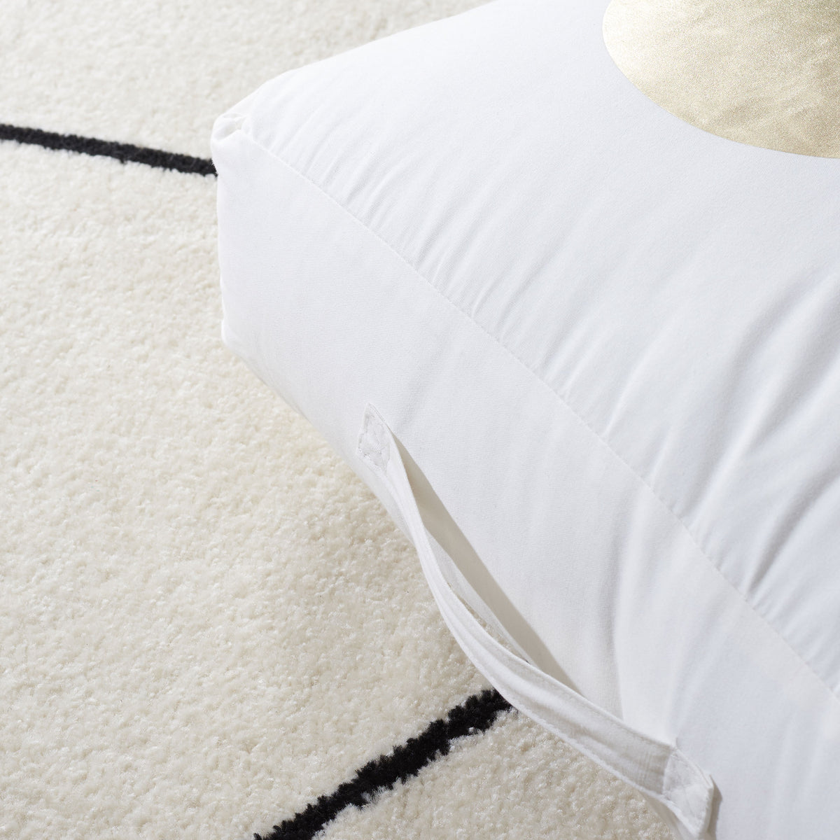 A neatly stitched fabric handle makes the plush floor pillow easy to carry || FLP1017A || handle_room