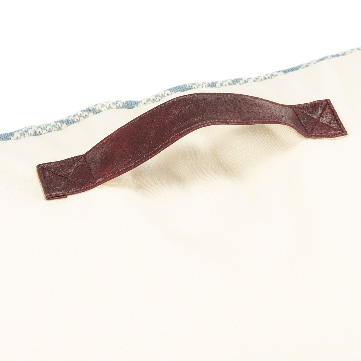 Brown carry handle with reinforced stitching adds a practical touch to the cream backing || FLP3002A || handle_studio