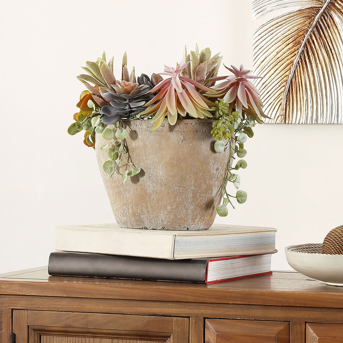 A variety of faux succulent shapes adds soft color to a tabletop. || FXP1010A || front_room