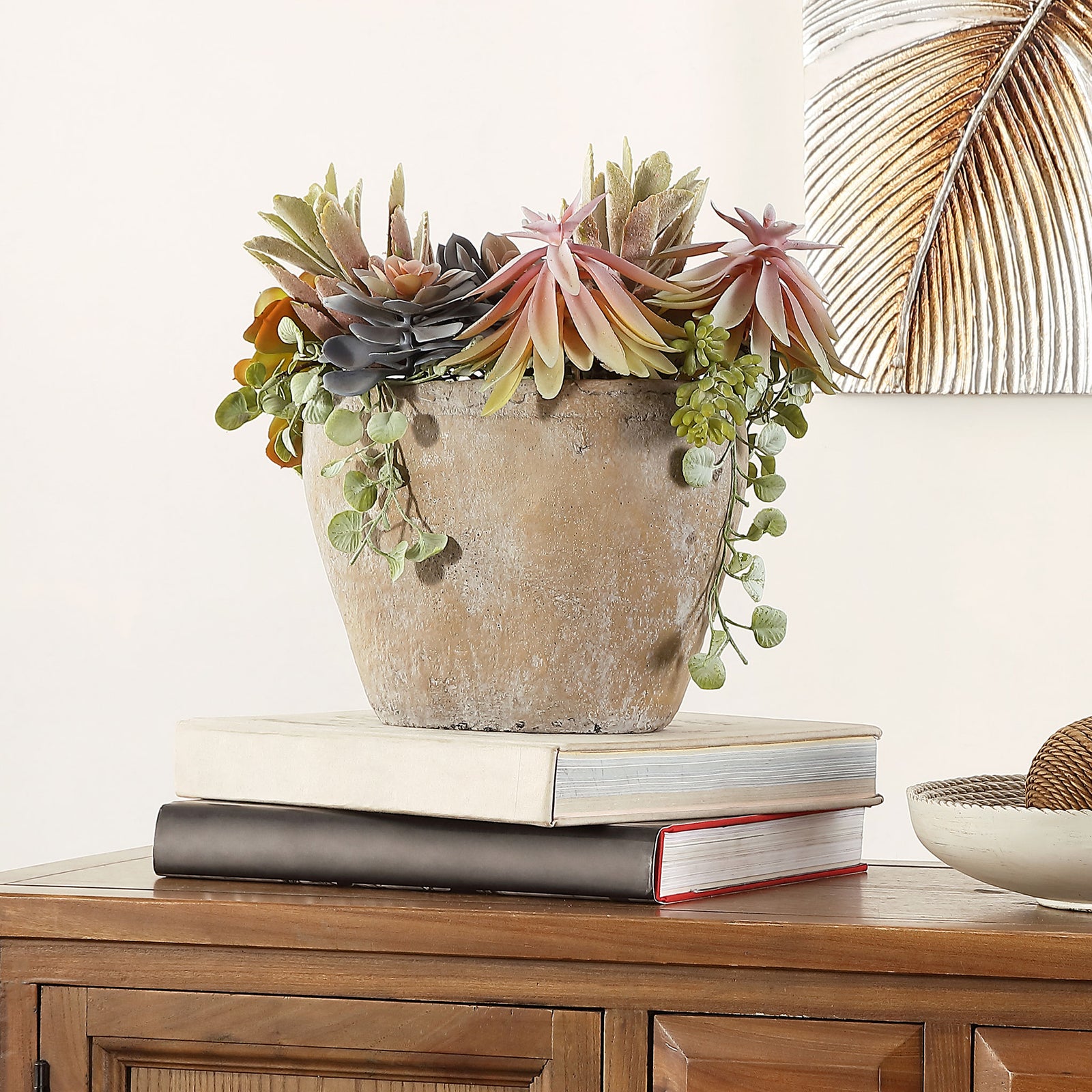 A variety of faux succulent shapes adds soft color to a tabletop. || FXP1010A || front_room