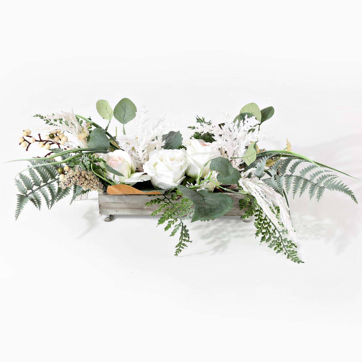 White roses and fern foliage fill a long rustic planter. || FXP1013A || front_studio