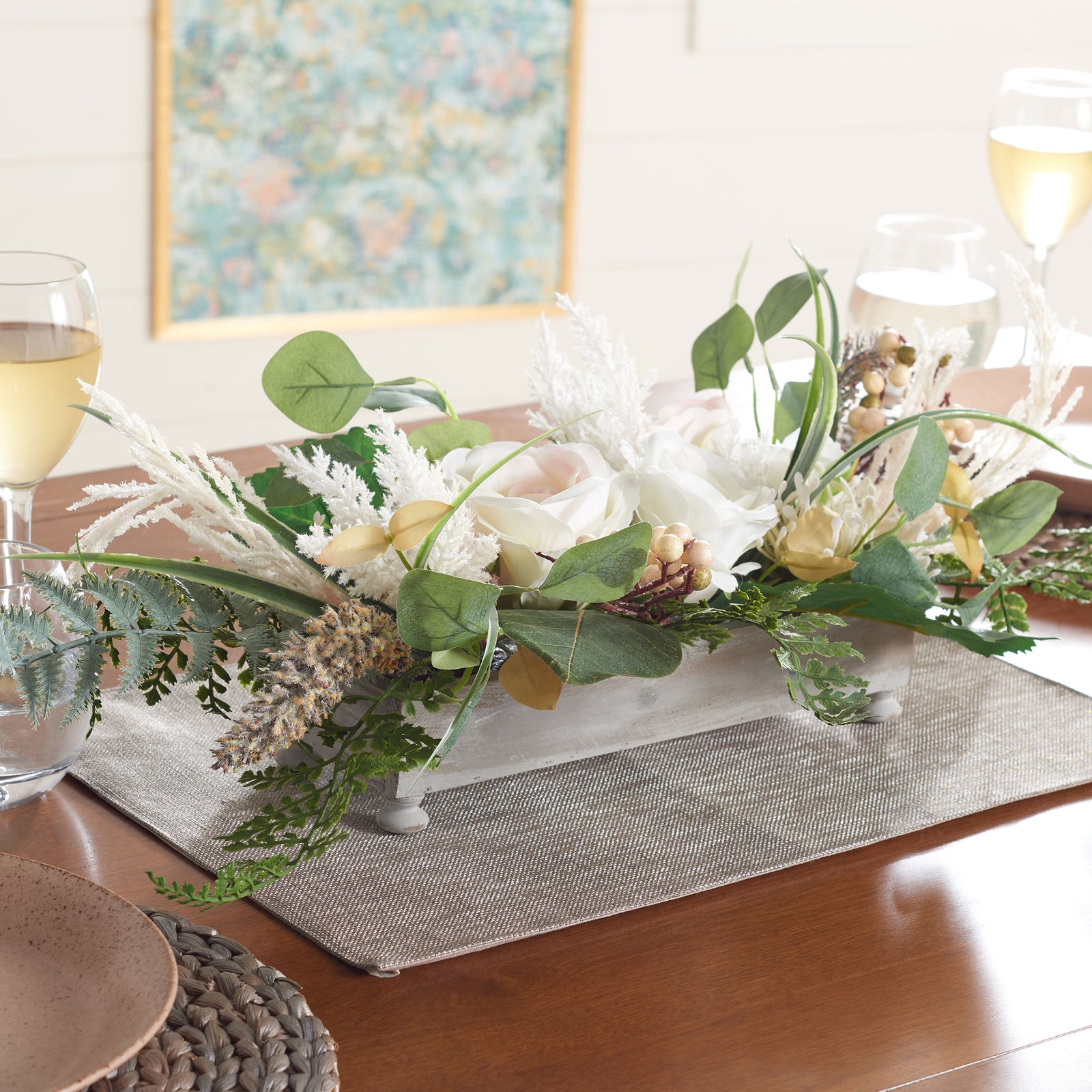 An airy rose and fern centerpiece brings fresh color to a dining table. || FXP1013A || front_angle_room