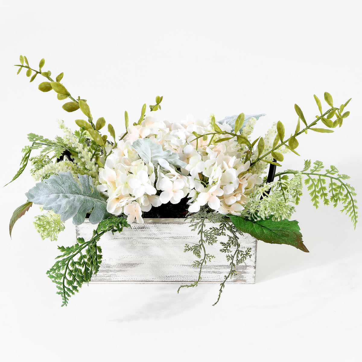 White hydrangeas and mixed greenery rise from a rustic rectangular box. || FXP1014A || front_studio