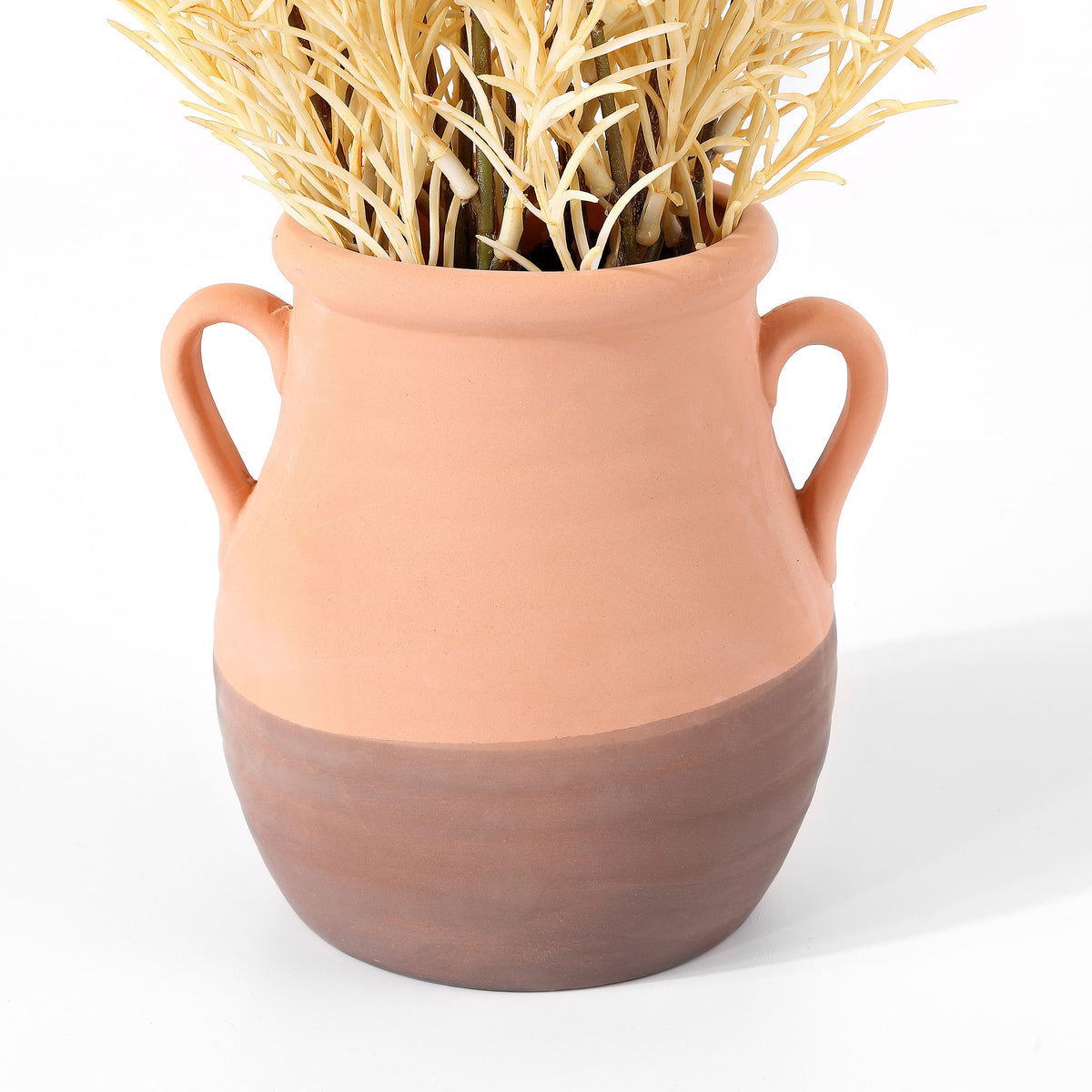 A two-handled terracotta pot has a contrasting dark clay base. || FXP1020A || leg_studio
