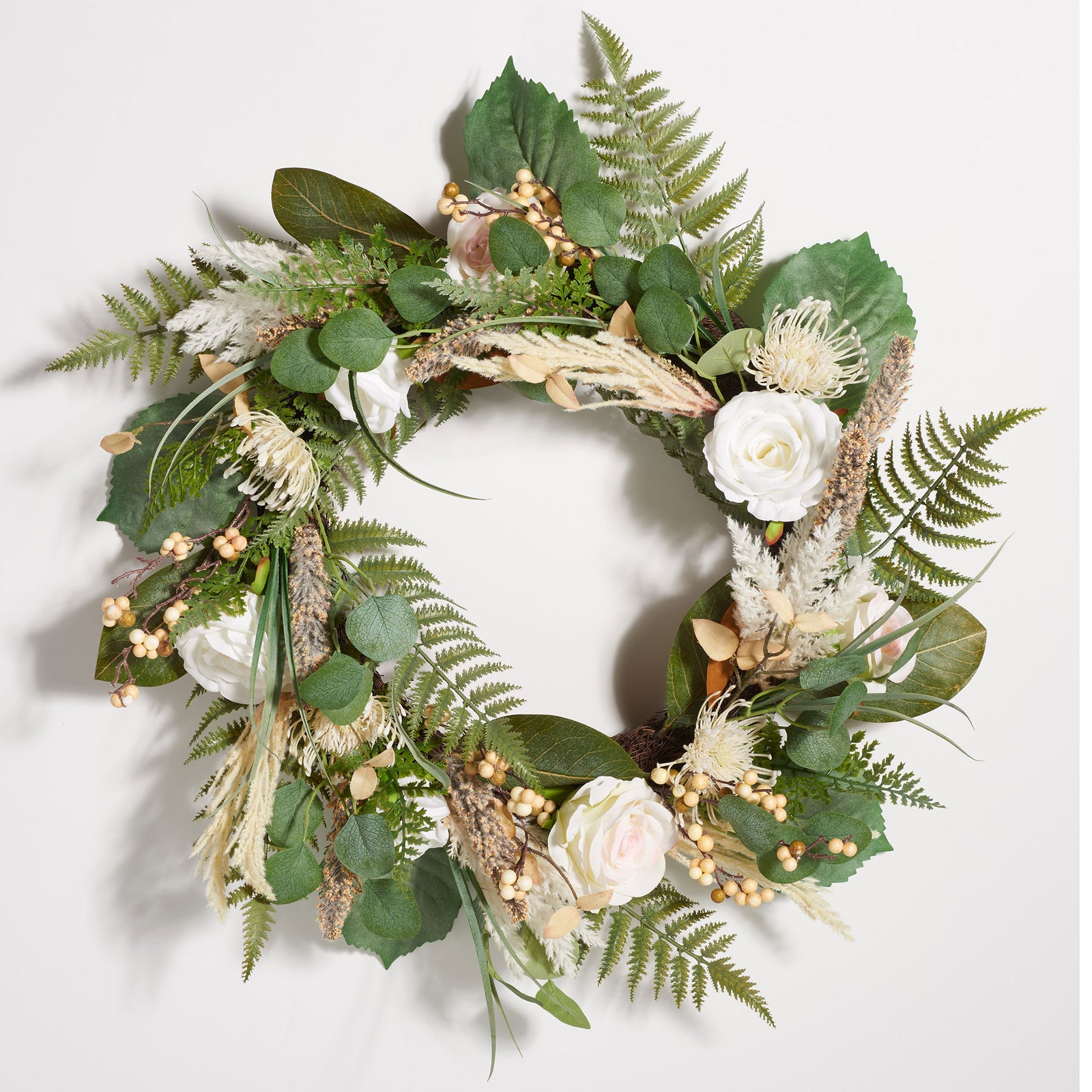 Ivory roses and textured greenery surround an open wreath center. || FXP1023A || front_studio
