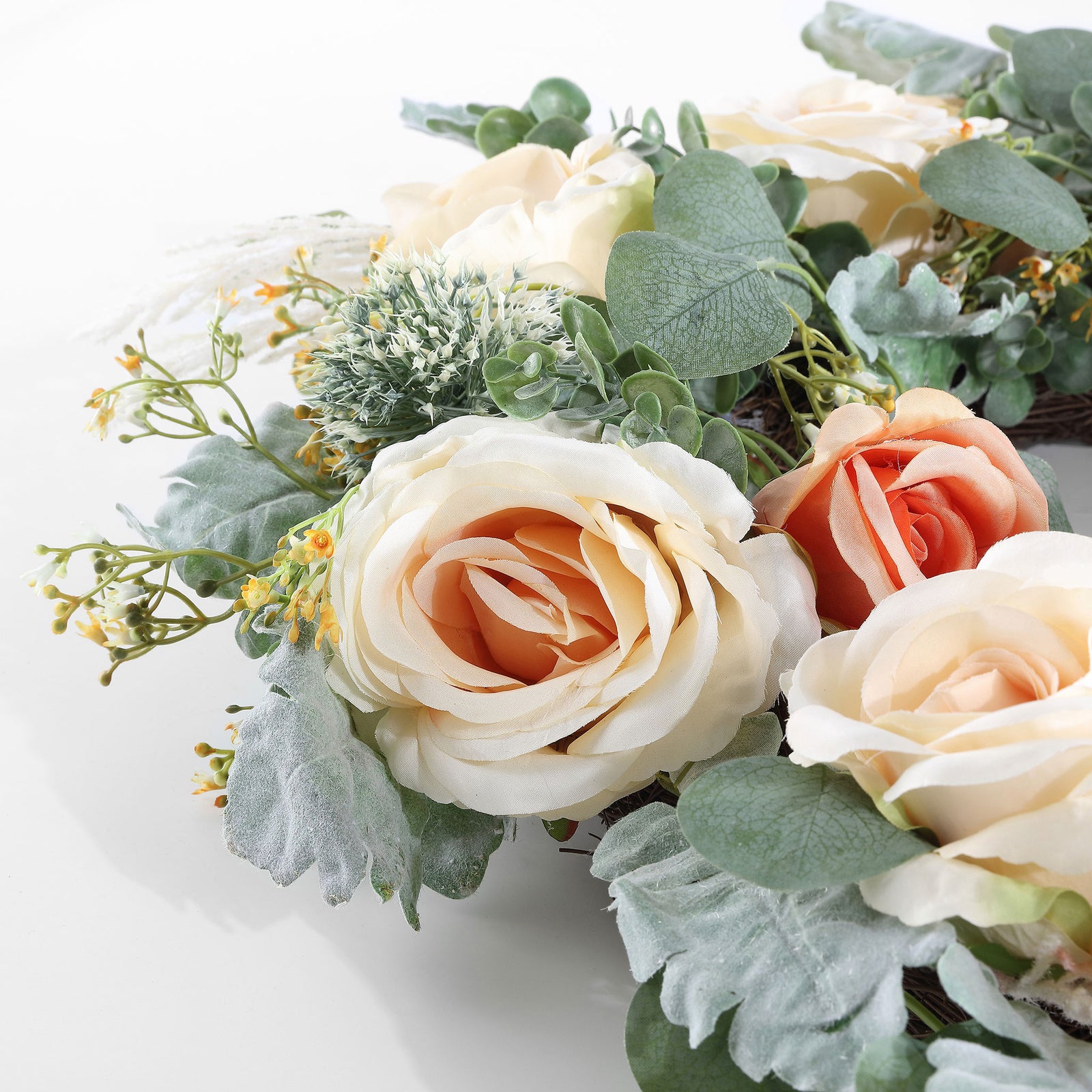 Cream and apricot roses mingle with rounded, dusty green leaves. || FXP1024A || detail_studio