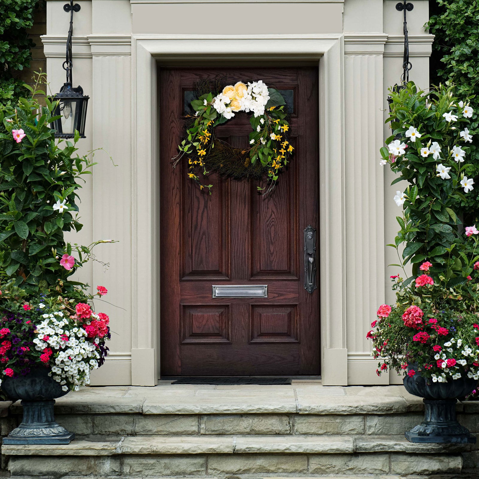 A light floral wreath brings spring color to an inviting doorway. || FXP1039A || front_room