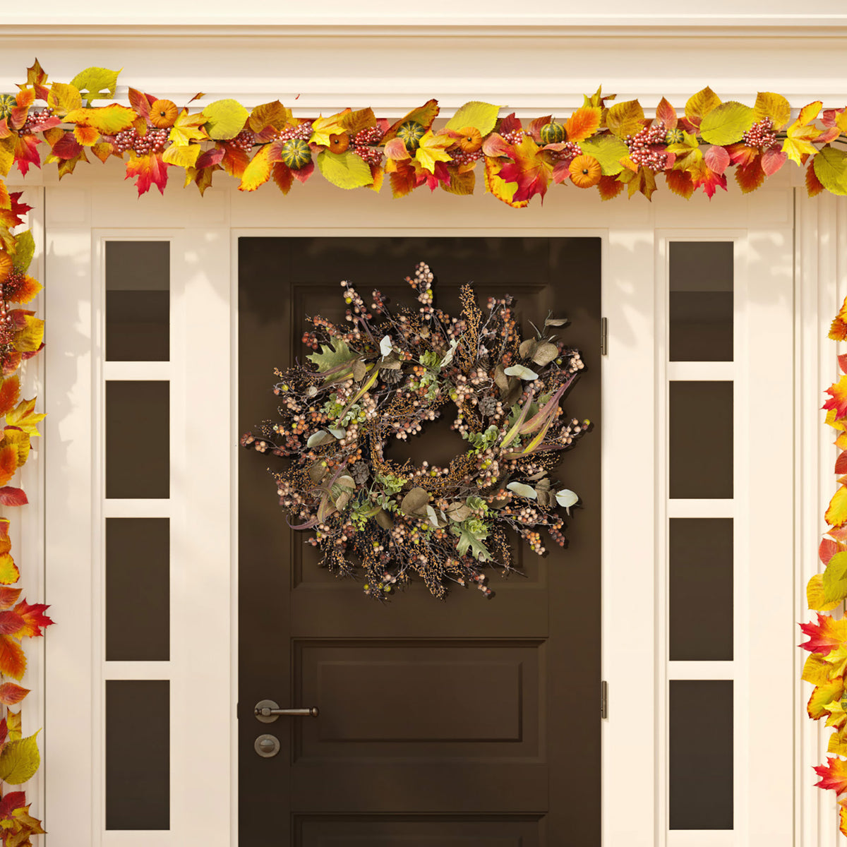 Muted berries, acorns, and leafy sprigs lend rustic charm to a doorway. || FXP1043A || front_room
