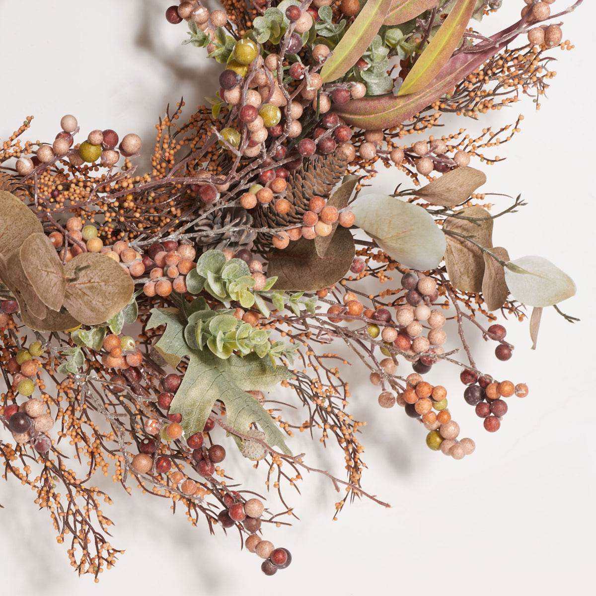 Blush and brown berries cluster among delicate twigs and soft green leaves. || FXP1043A || detail_studio