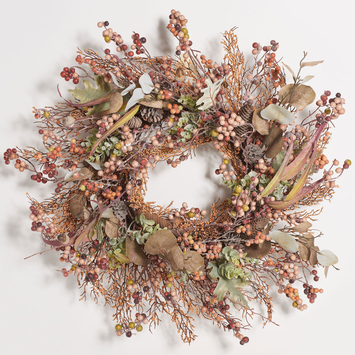 Earth-toned berries and acorns give this leafy wreath a natural harvest look. || FXP1043A || front_studio