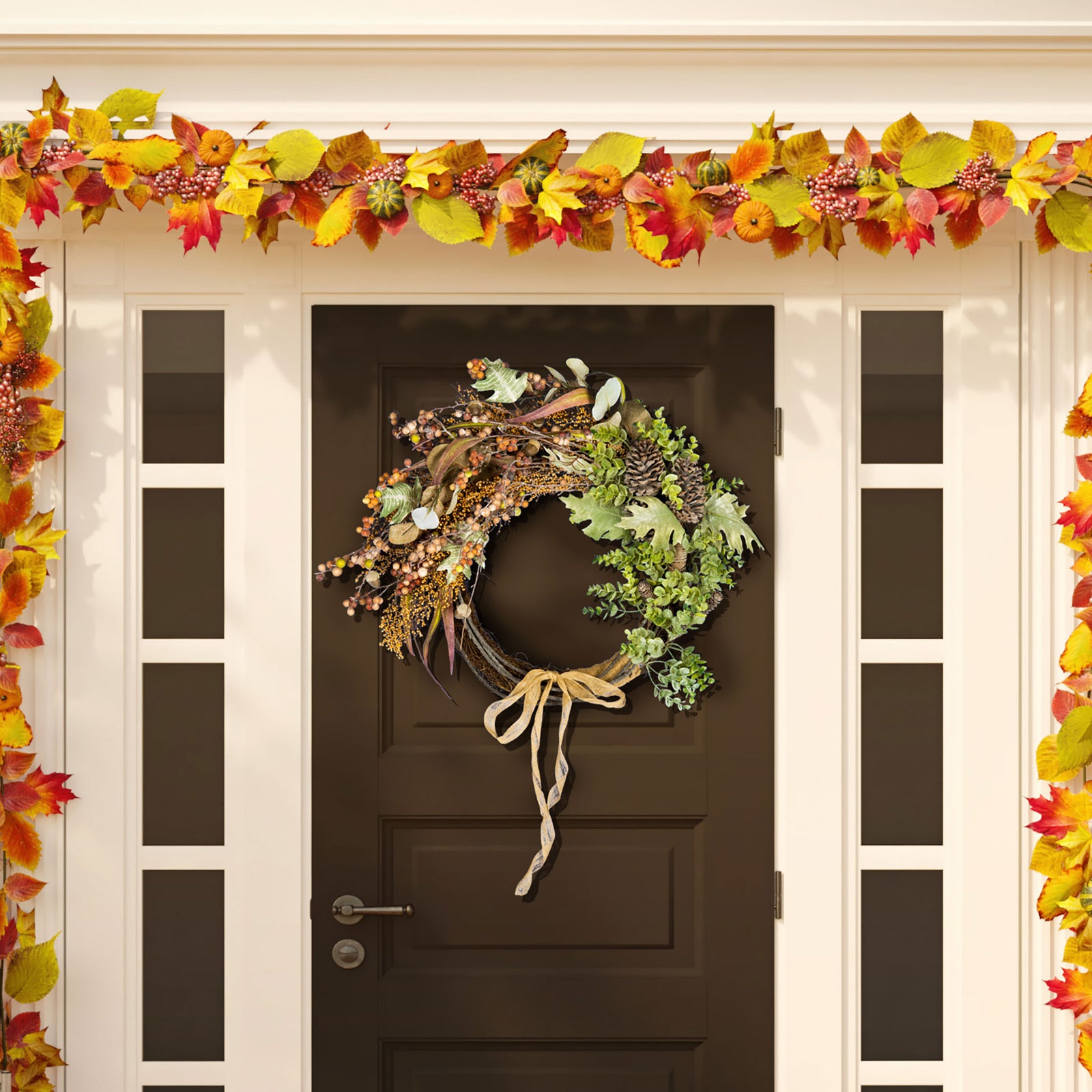 Berries and sage-green foliage sweep around a twig wreath with a hanging bow. || FXP1044A || front_room