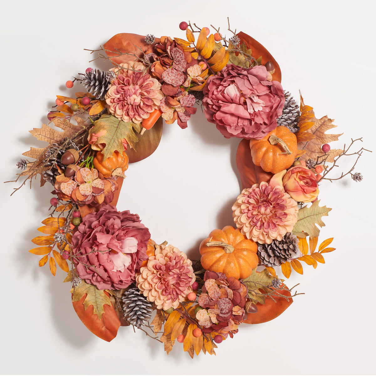 Dusty pink peonies, orange pumpkins, and leaves fill a festive fall wreath. || FXP1053A || front_studio