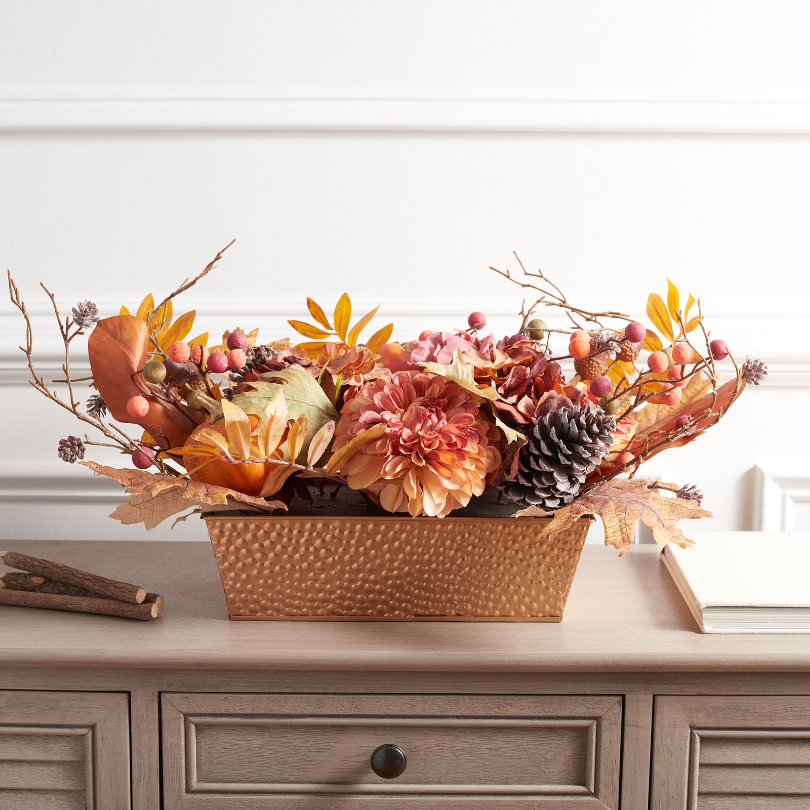 A compact pumpkin and peony arrangement adds fall color to a console. || FXP1057A || front_room