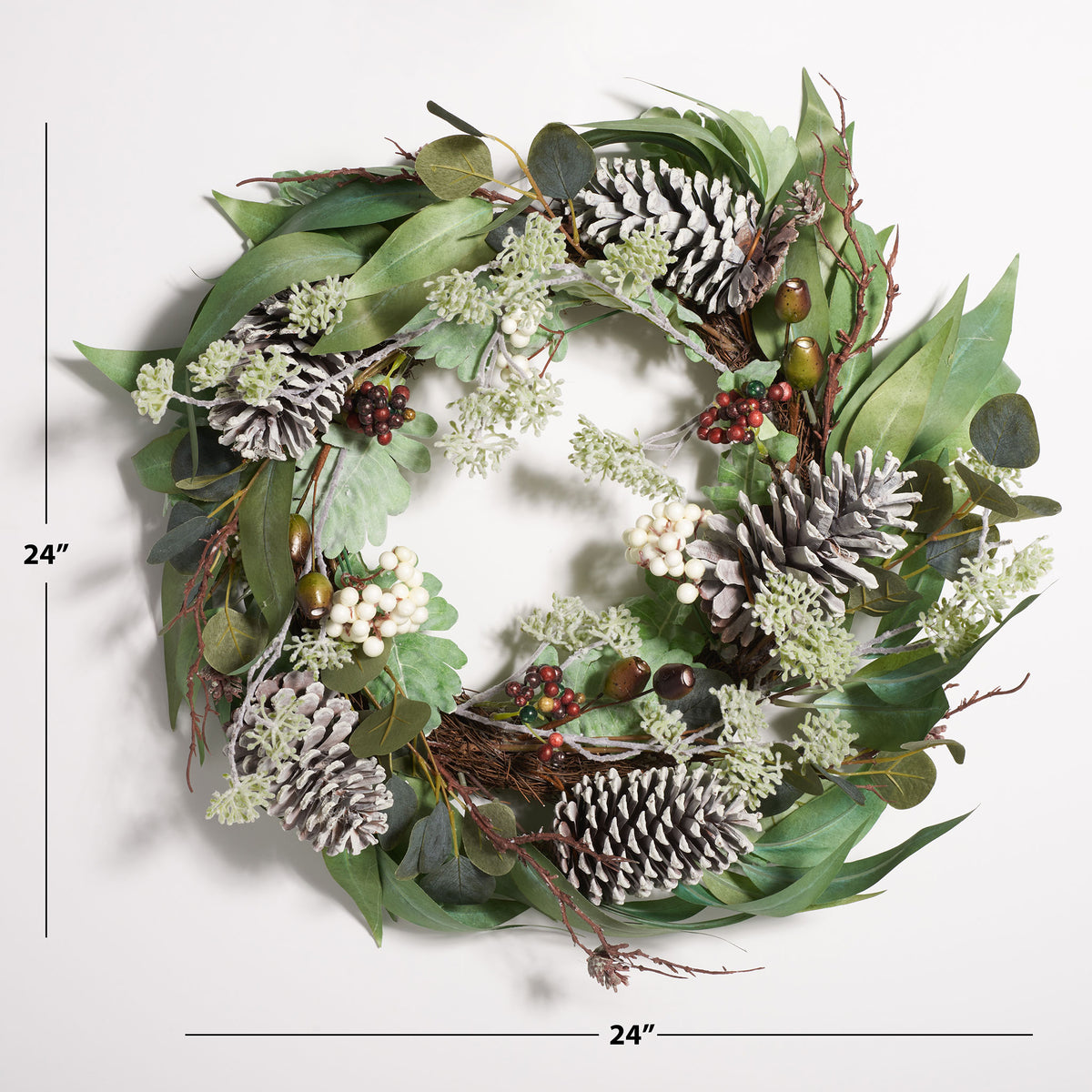 A 24-inch wreath combines eucalyptus foliage, berries, and pine cones. || FXP1072A || dimension_studio