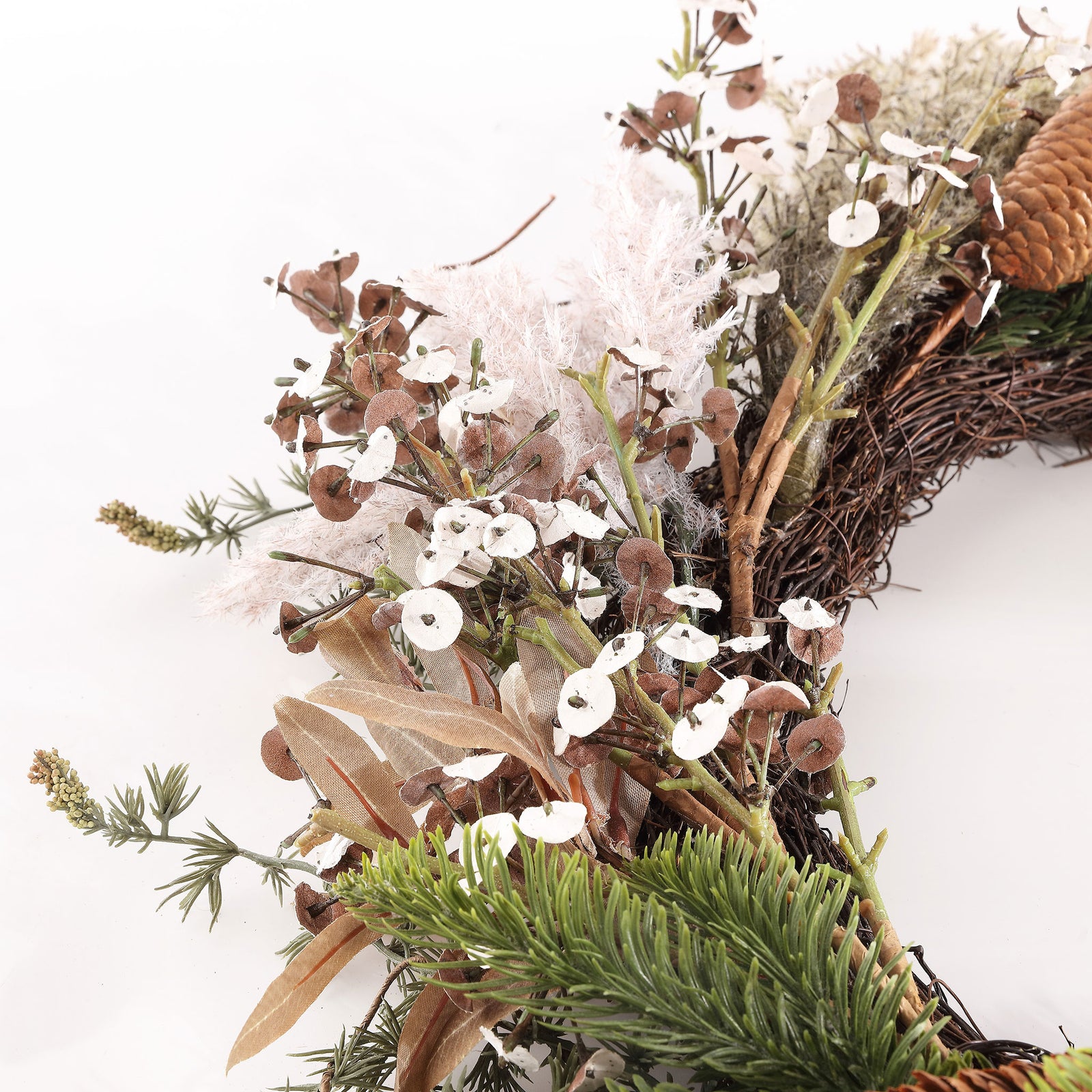 Small white blossoms and wispy branches soften a rustic twig ring. || FXP1095A || detail_studio