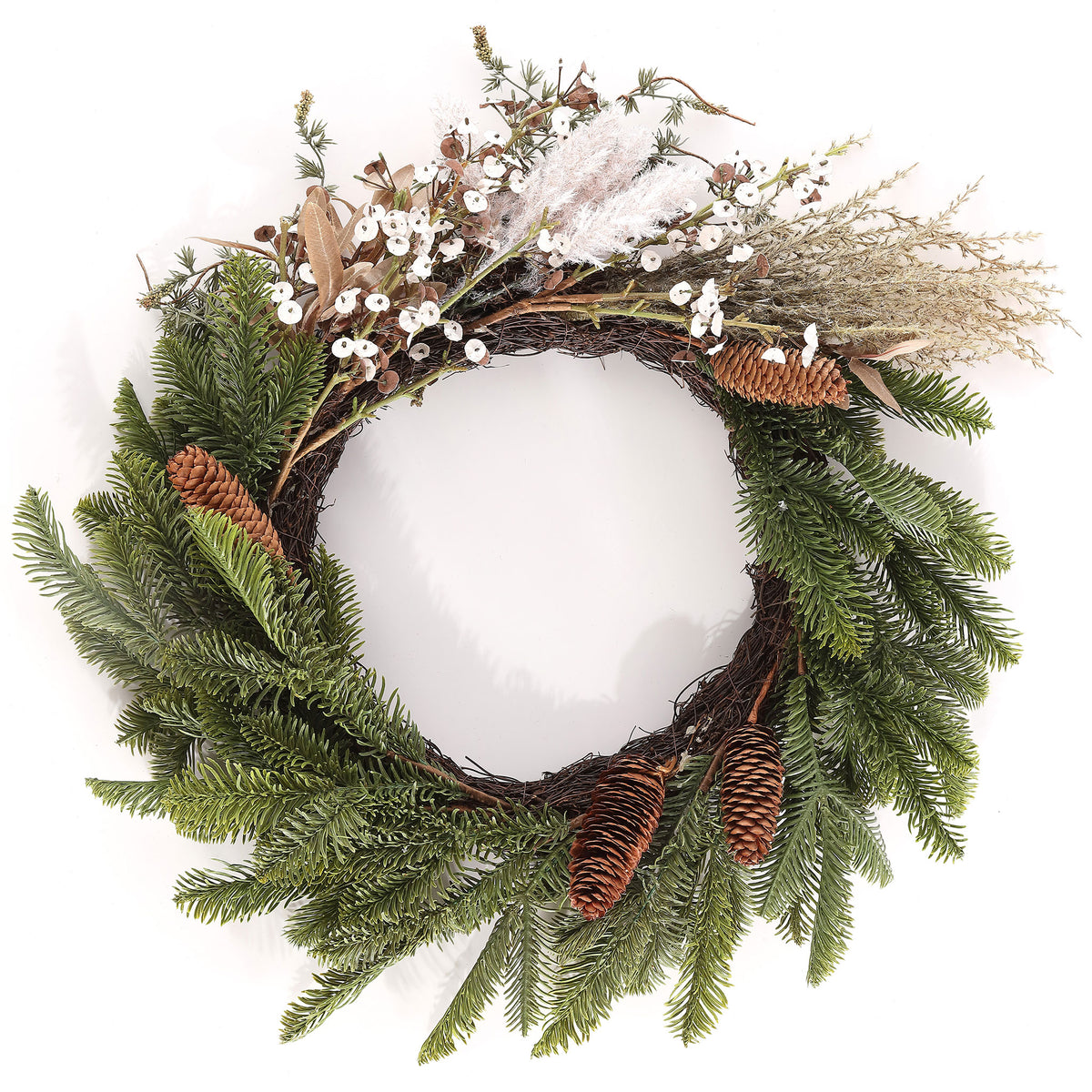 Green pine boughs balance airy white blossoms and hanging pine cones. || FXP1095A || front_studio
