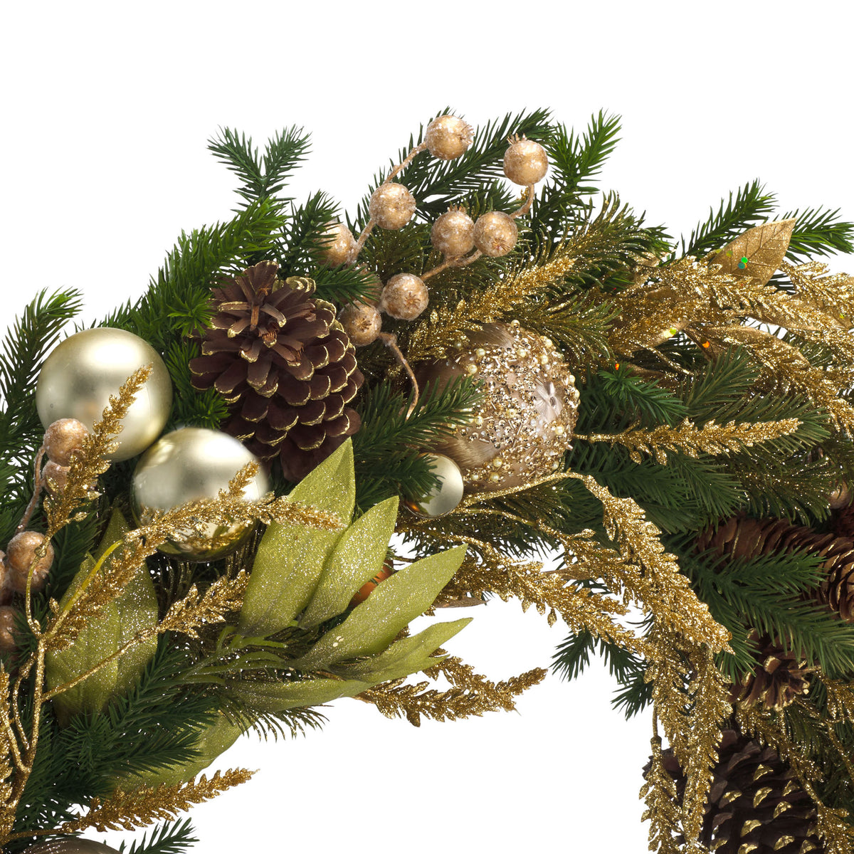 Glittered gold foliage, pinecones, and metallic baubles enrich the evergreen branches