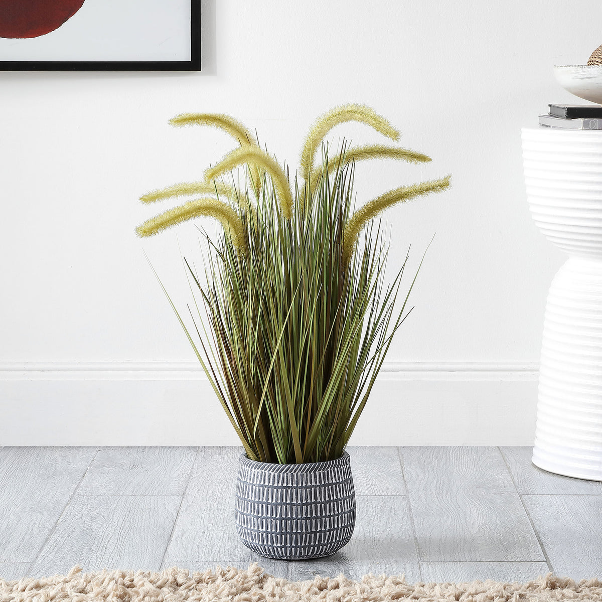 Feathery grass adds an airy accent to a bright interior. || FXP2000A || front_room
