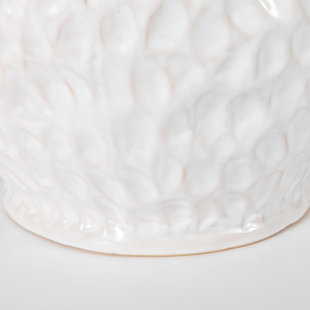 Softly sculpted texture extends across the white ceramic planter. || FXP2030A || leg_studio