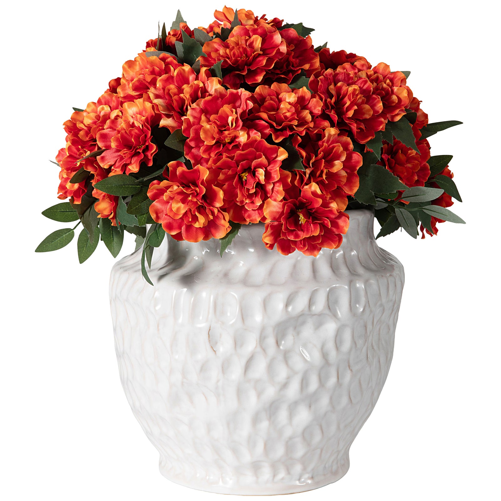 A mound of red and orange marigolds tops a sculptural white ceramic pot. || FXP2030A || front_studio