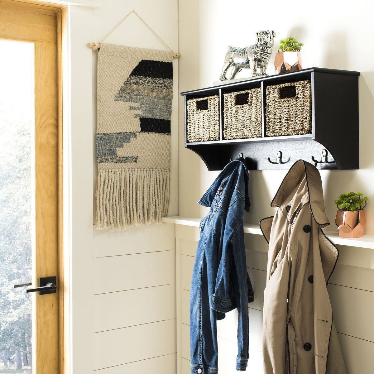A wall-mounted black rack holds woven baskets and keeps coats close at hand in an entryway || HAC5700A || front_angle_room