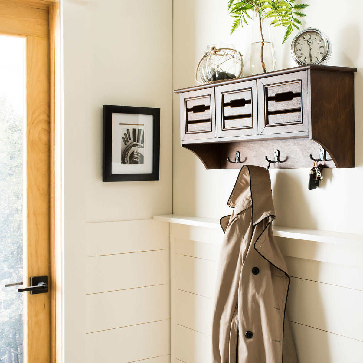 A wood wall rack keeps coats and keys within reach, with drawers and a top ledge for small decor. || HAC5701B || front_angle_room